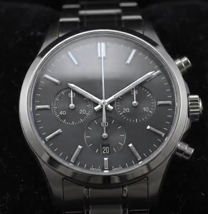 Méridien with slate grey dial on a steel bracelet